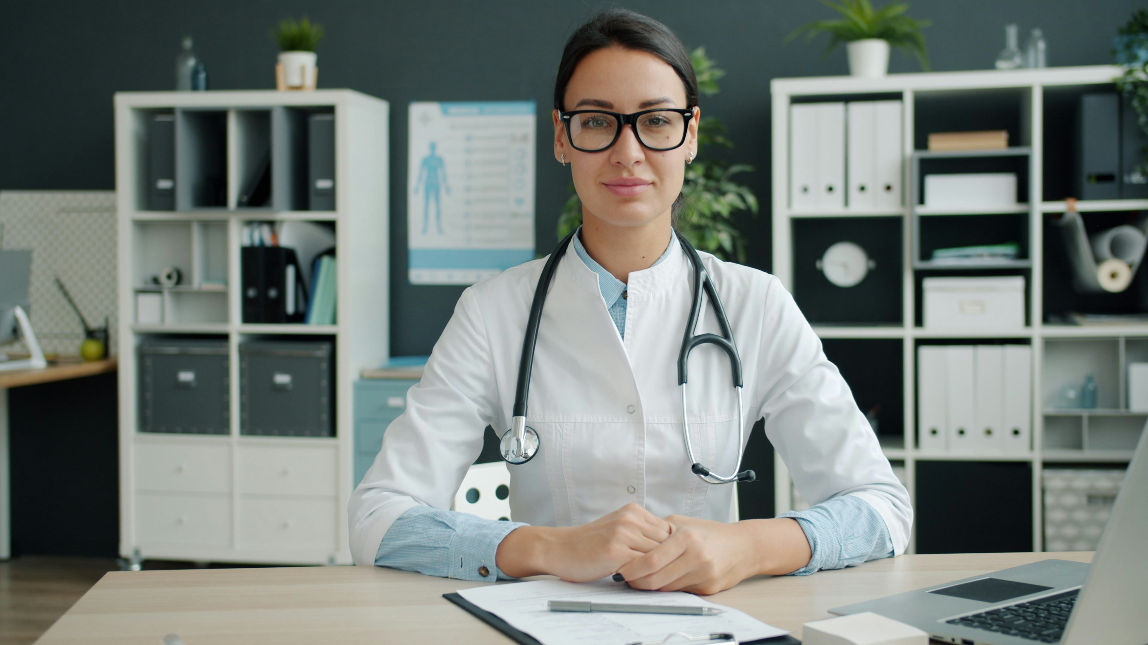 Female fertility doctor at her desk