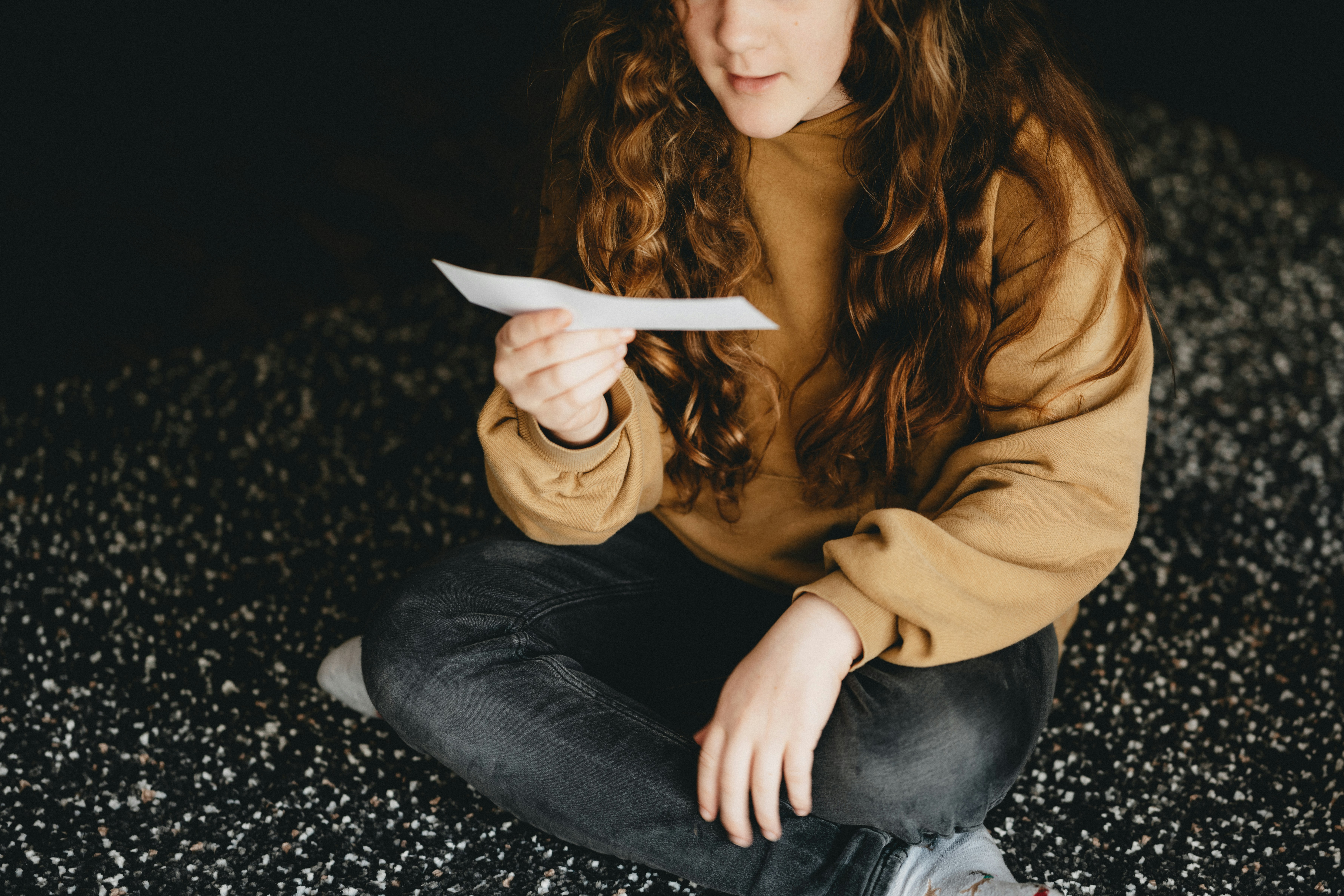 Woman reading her fertility test results